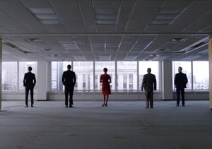 Pete, Don, Joan, Bert, and Roger stand in their new office space.